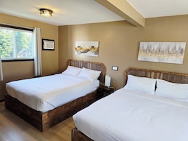 Economy Quadruple Room, 2 Queen Beds, Kitchenette | Iron/ironing board, free WiFi, bed sheets
