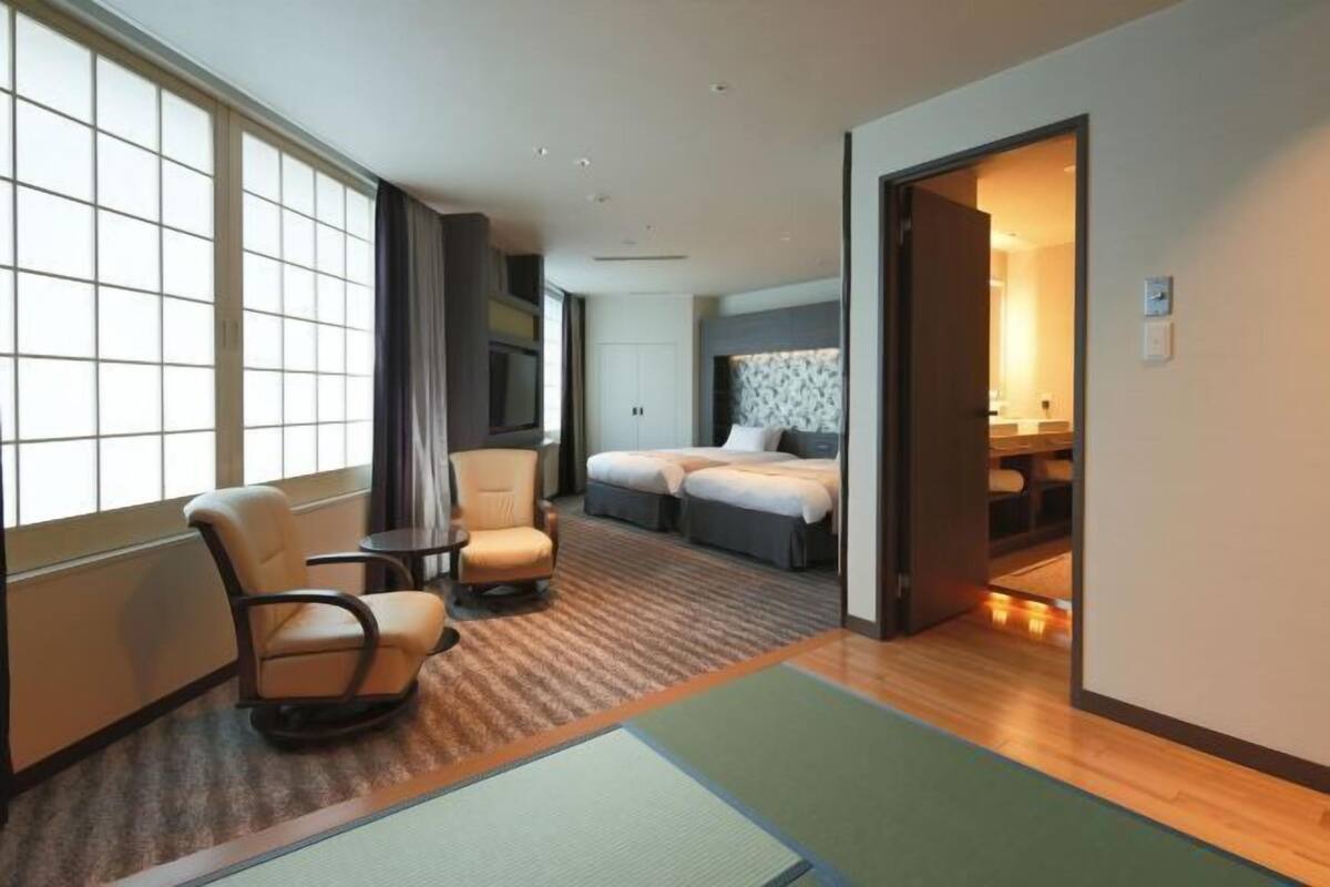 Premium bedding, down duvets, desk, laptop workspace