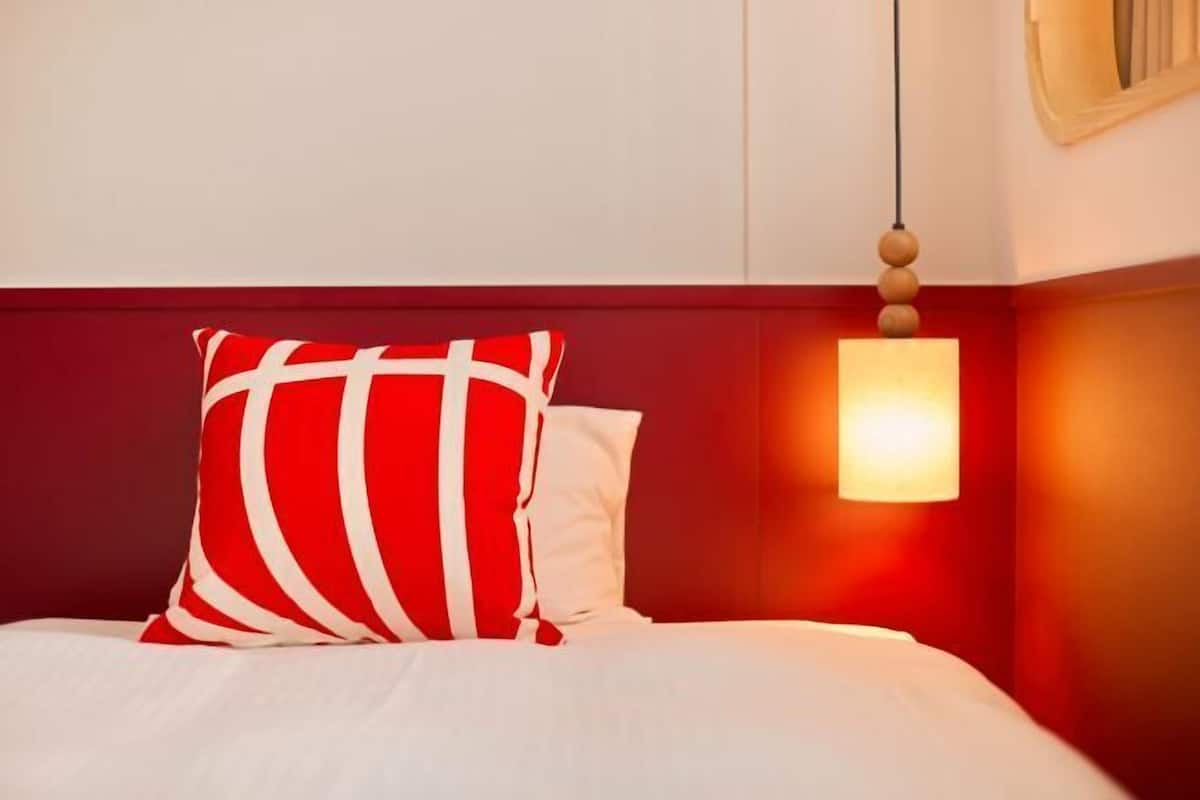 Premium bedding, down duvets, desk, laptop workspace