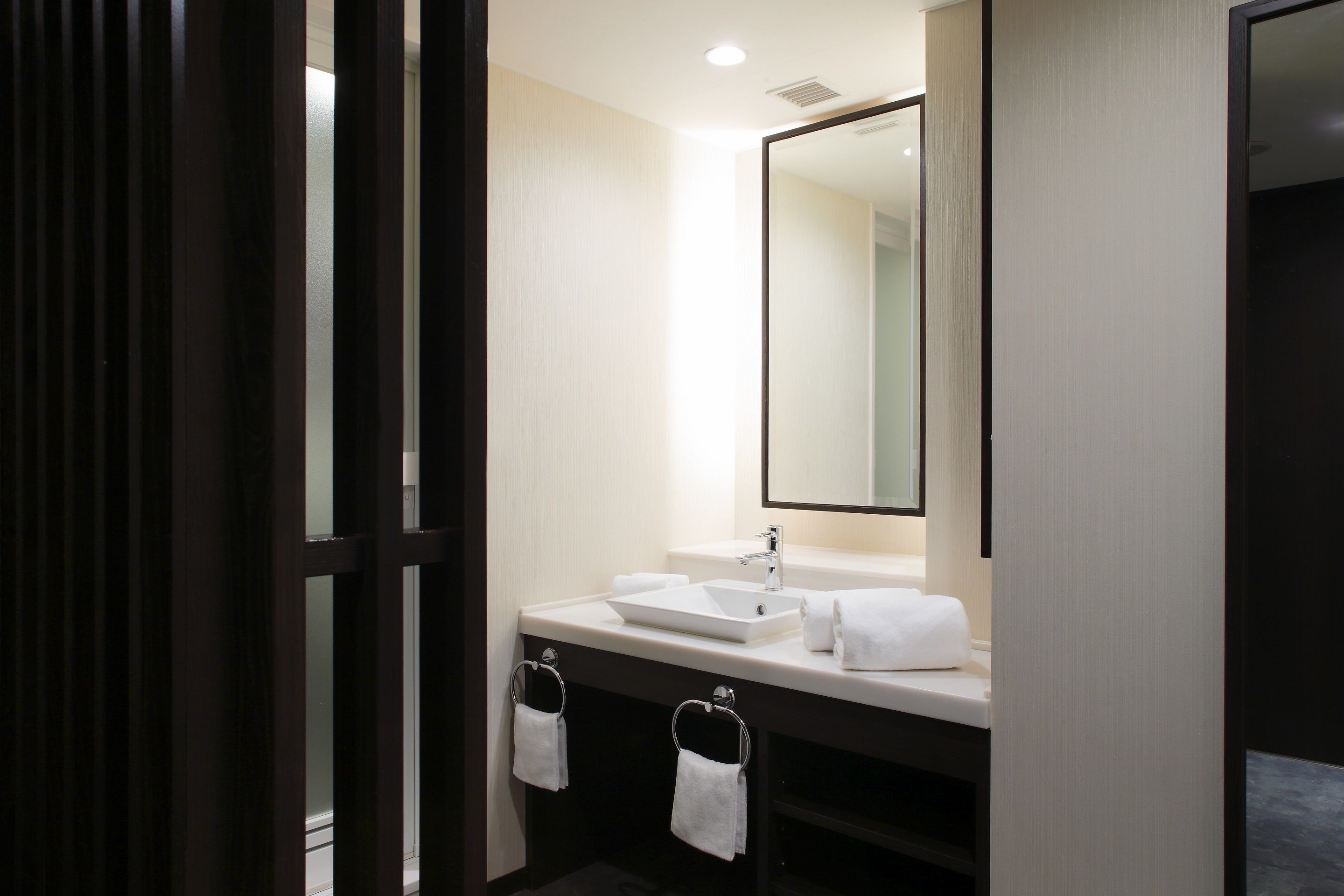 premium bedding, down duvets, desk, laptop workspace