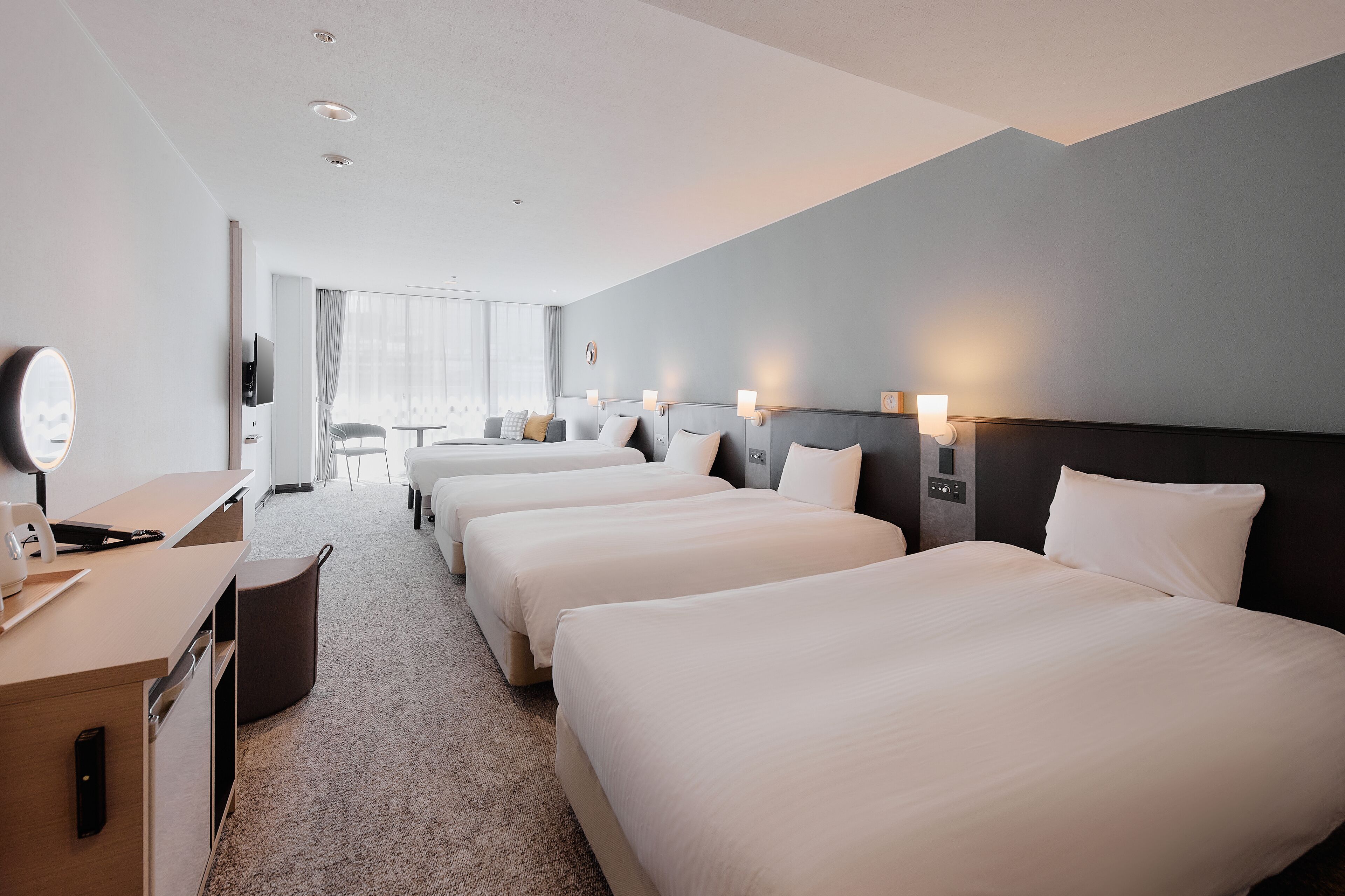 [large twin] 37 square meters | premium bedding, down duvets, desk, laptop workspace