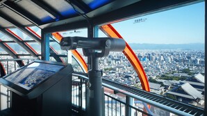 A panoramic view from a high vantage point, likely a tourist observation deck, overlooking a densely populated city with traditional and modern architecture. - Kyoto Tower Hotel (Kyoto)