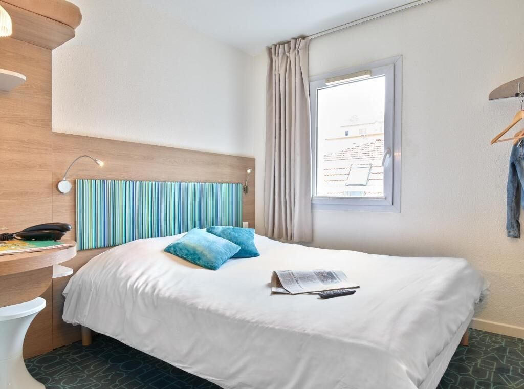 desk, blackout curtains, iron/ironing board, free cots/infant beds