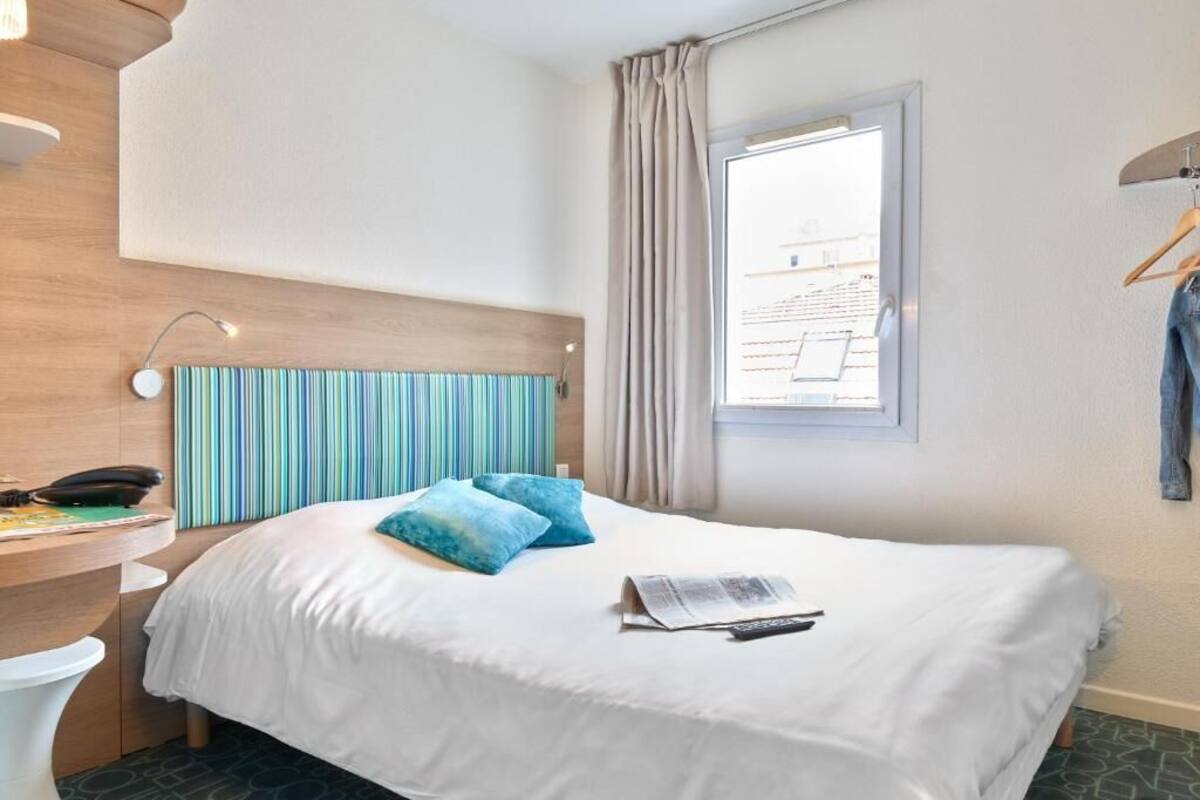 desk, blackout curtains, iron/ironing board, free cots/infant beds