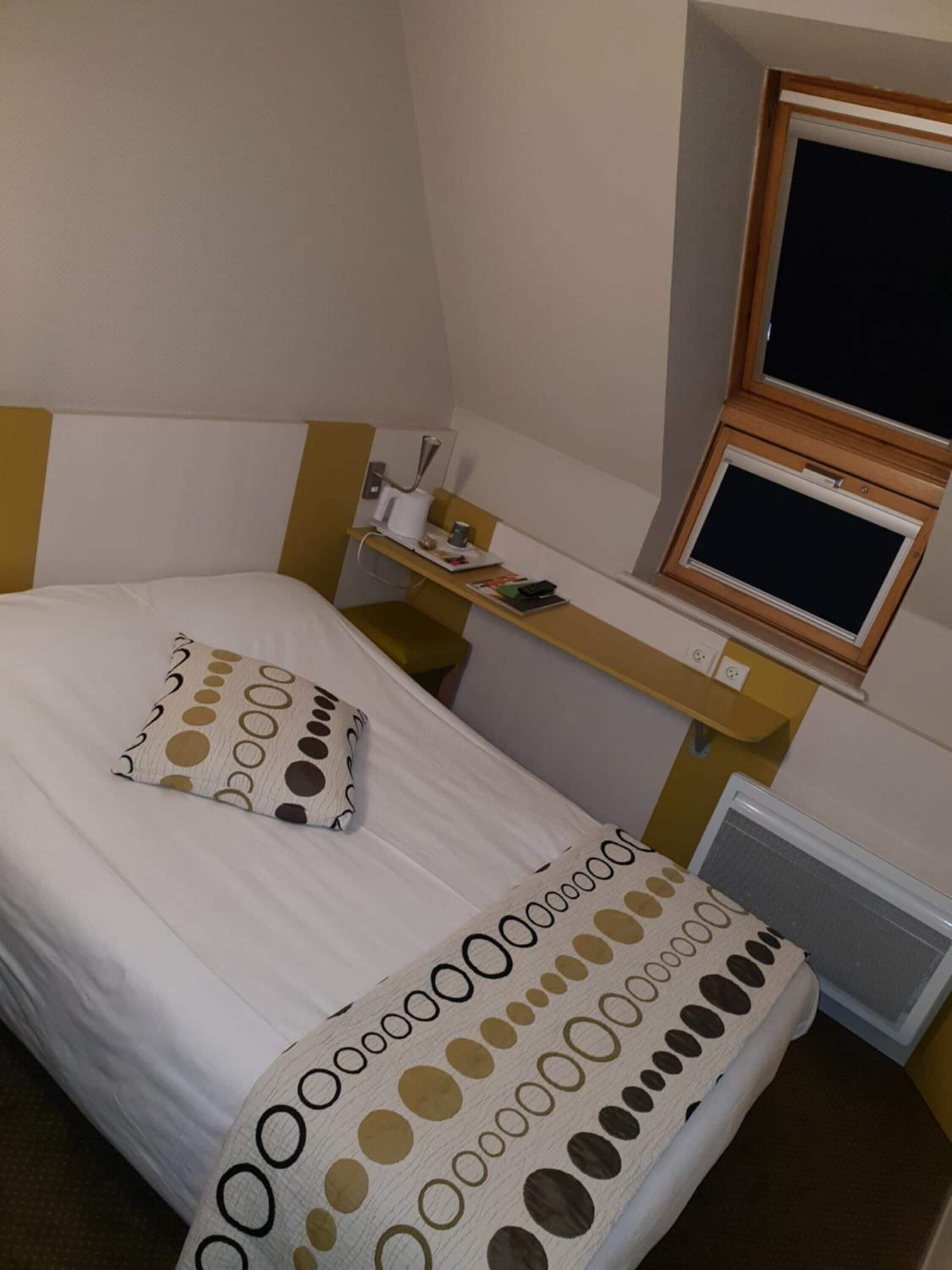 desk, blackout curtains, iron/ironing board, free cots/infant beds