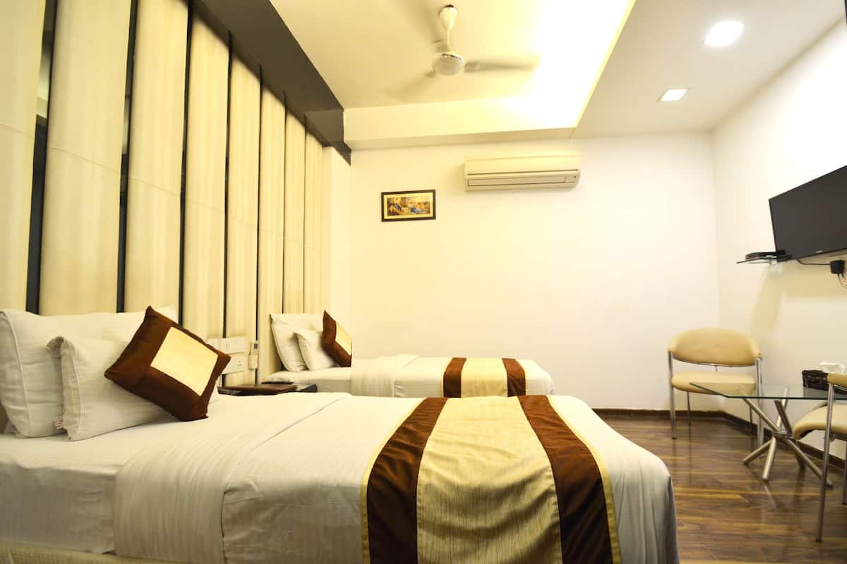 Egyptian cotton sheets, premium bedding, minibar, in-room safe