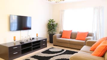 Self-Catering Luxury Apartment | Living area | TV
