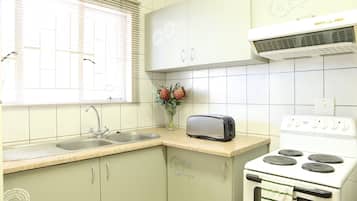 Self-Catering Luxury Apartment | Private kitchen | Fridge