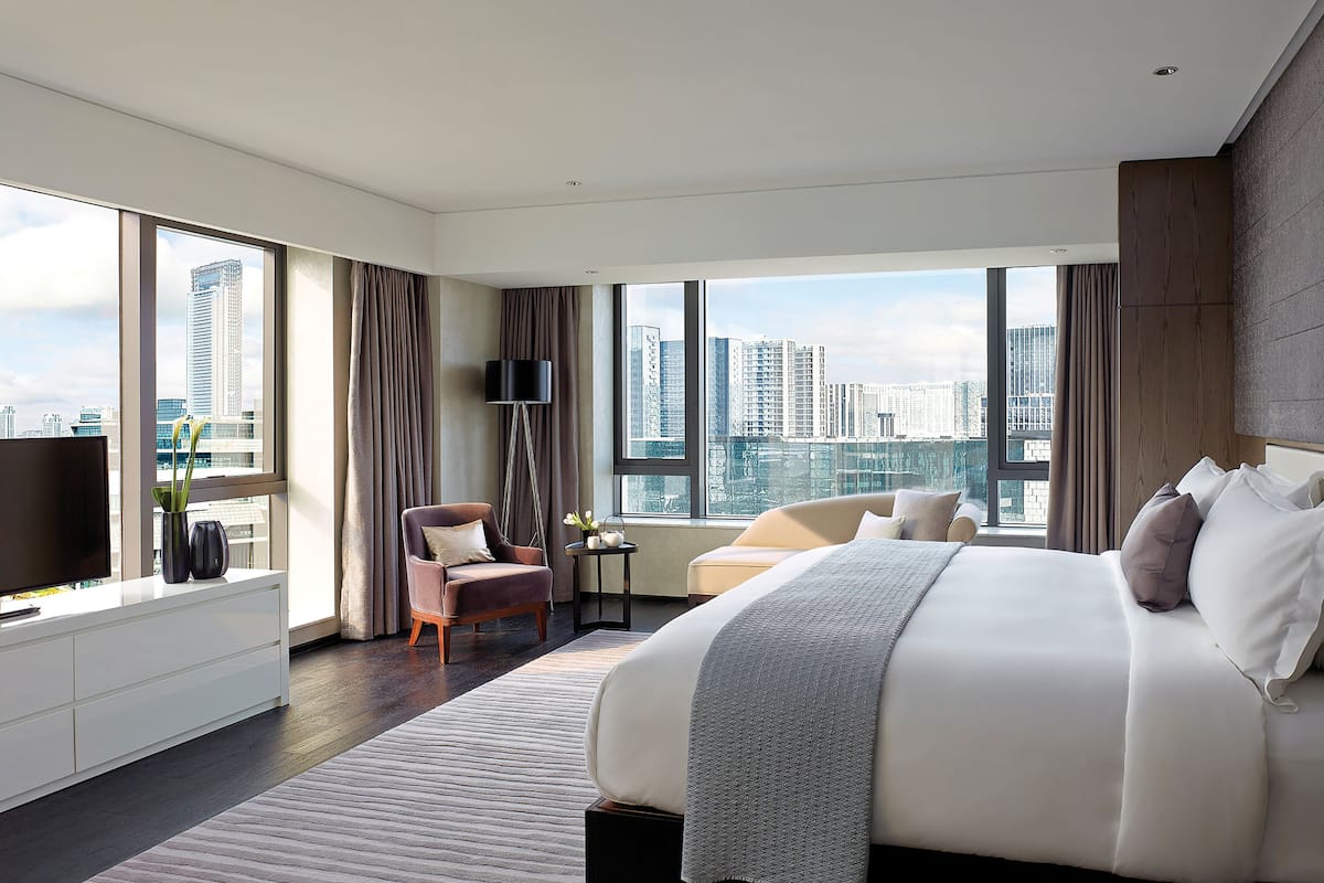 suite, 1 bedroom, river view | 1 bedroom, minibar, in-room safe, iron/ironing board