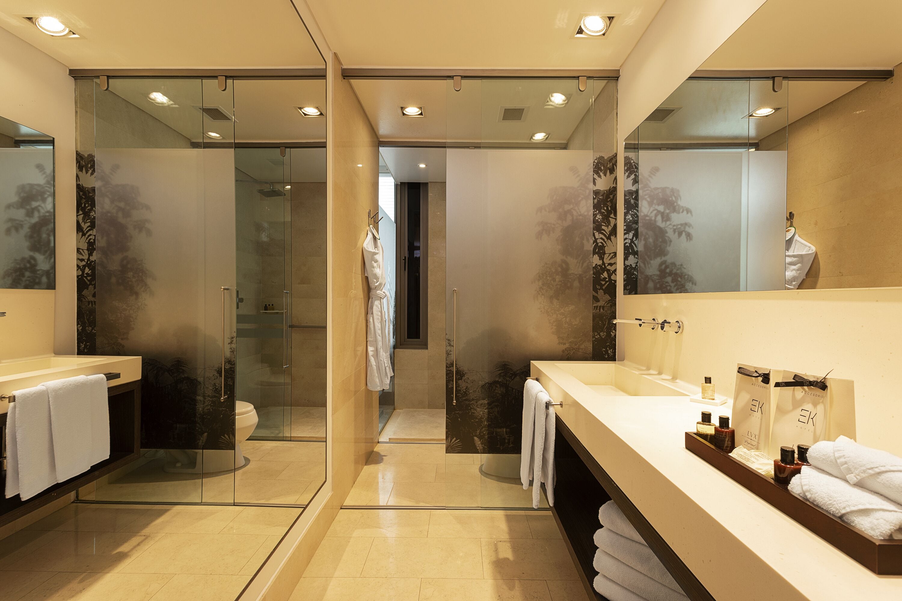 superior twin room | bathroom | rainfall showerhead, designer toiletries, hair dryer, bathrobes