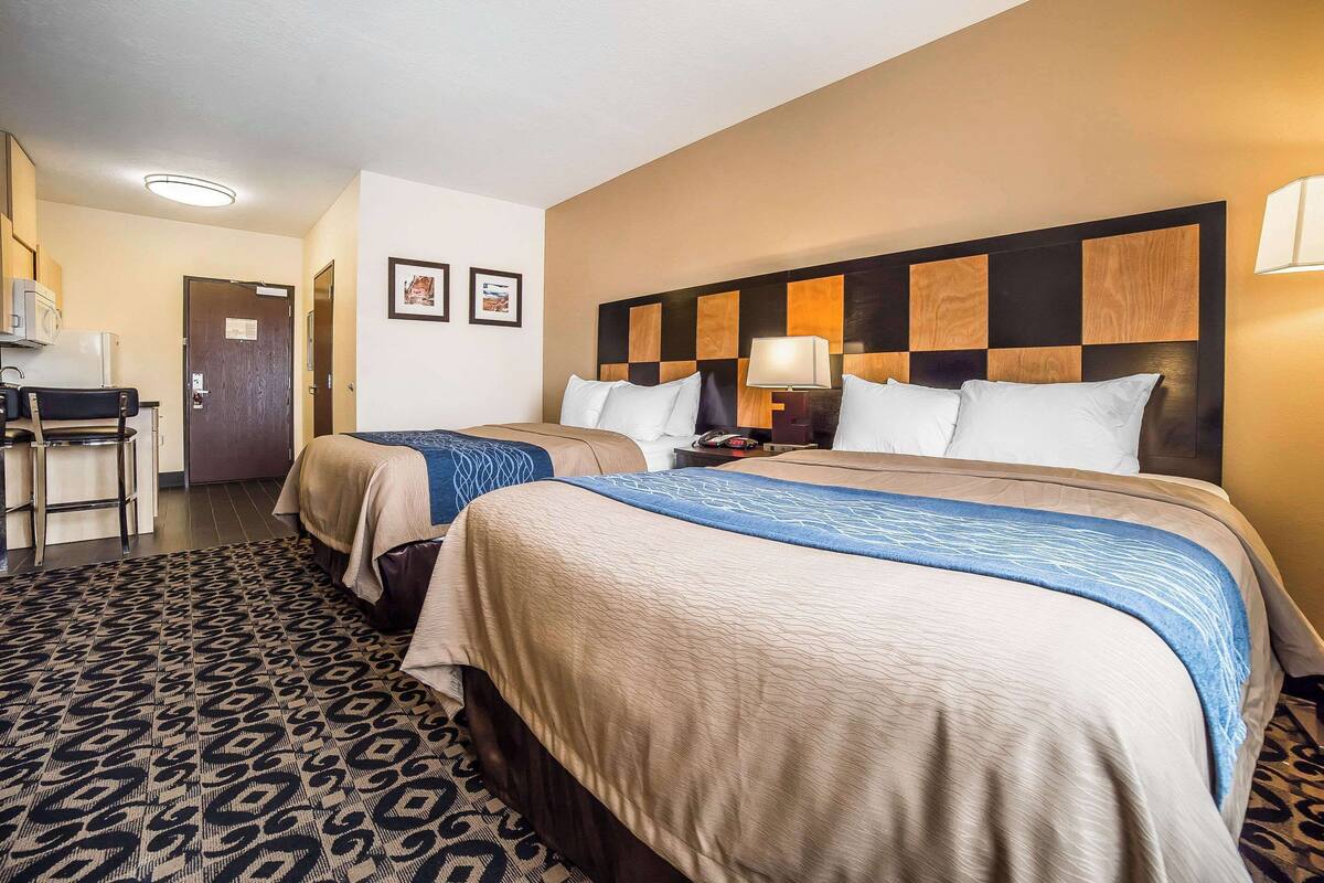 room, 2 queen beds, non smoking, kitchenette | individually decorated, individually furnished, desk, iron/ironing board