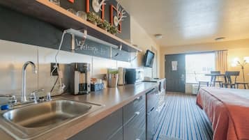 Standard King with Kitchenette | Living area | Flat-screen TV