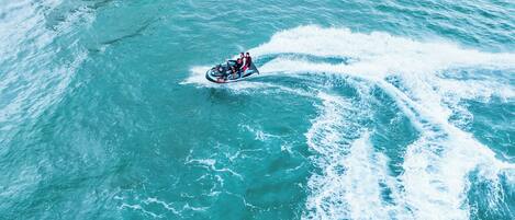 A jet ski on turquoise water.