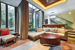 Villa Deluxe, 2 habitaciones, alberca privada | Sala de estar | Televisión LED 