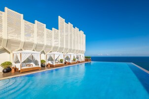 5 outdoor pools, open 9:00 AM to 10:00 PM, pool umbrellas, sun loungers