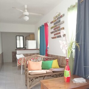 Traditional Apartment, 1 Bedroom, Garden View | Living area | 14-inch flat-screen TV with cable channels, TV