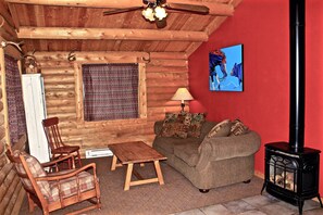 Cabin, 2 Bedrooms (Evergreen) | Living room | Fireplace