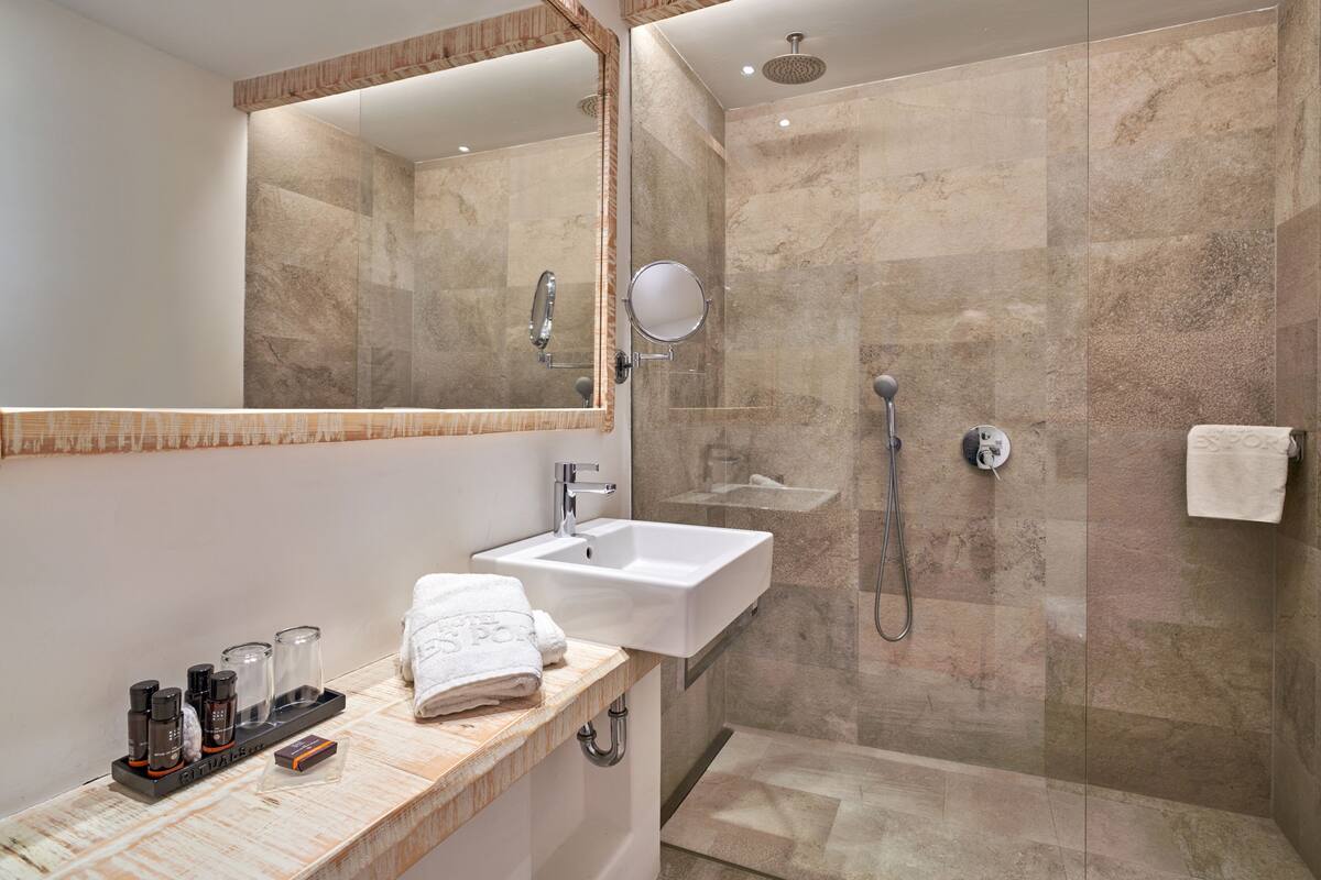 eco-friendly toiletries, hair dryer, bathrobes, towels