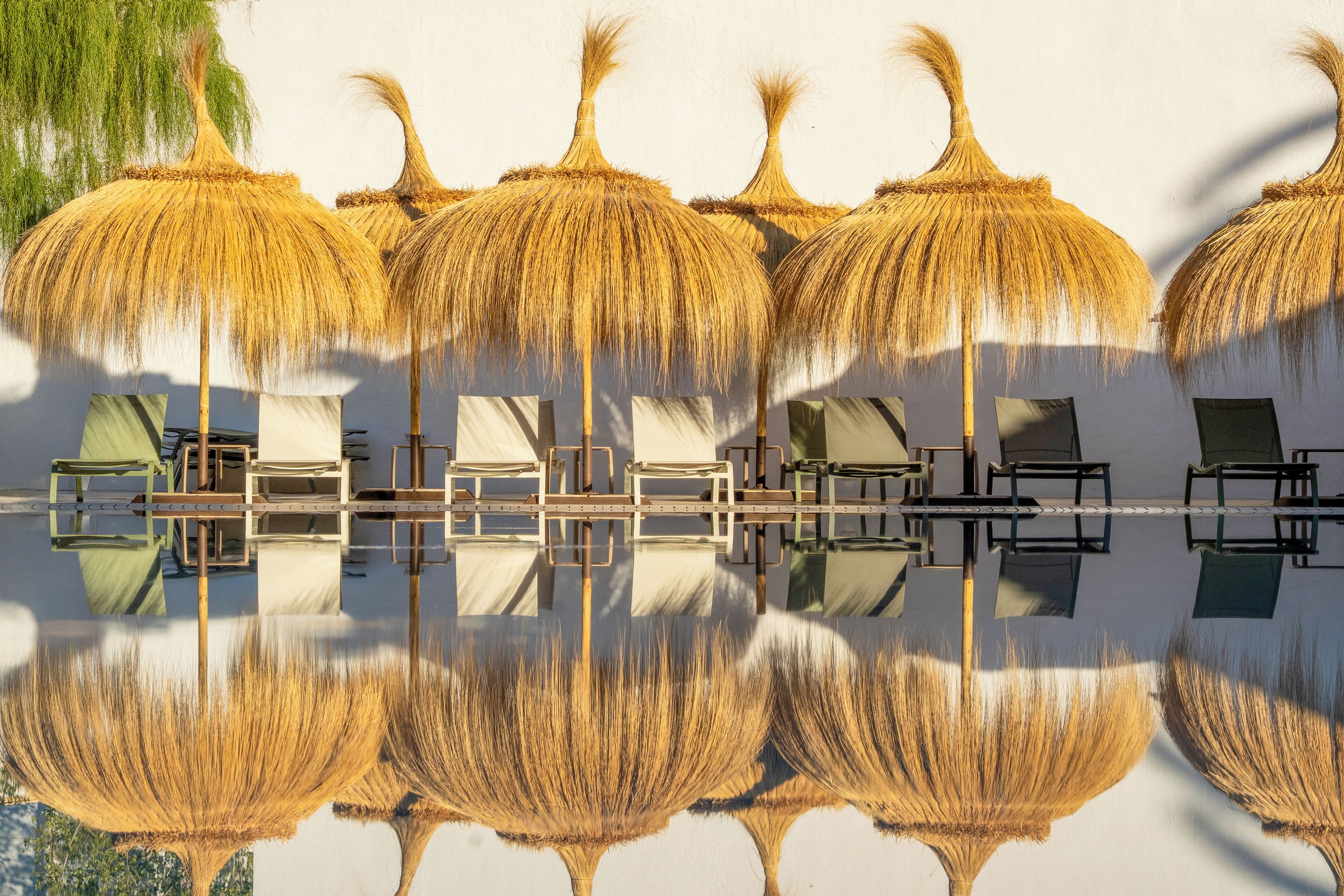 Indoor pool, seasonal outdoor pool, pool umbrellas, pool loungers