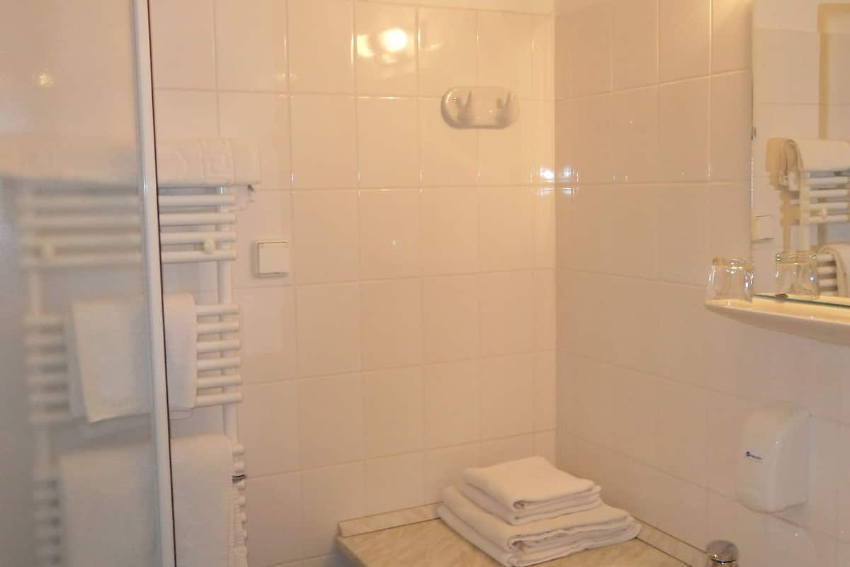 twin room, 2 single beds | bathroom | shower, hair dryer, towels