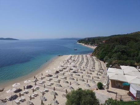 Private beach nearby, sun loungers, beach umbrellas, beach towels. Aristoteles Holiday Resort & Spa