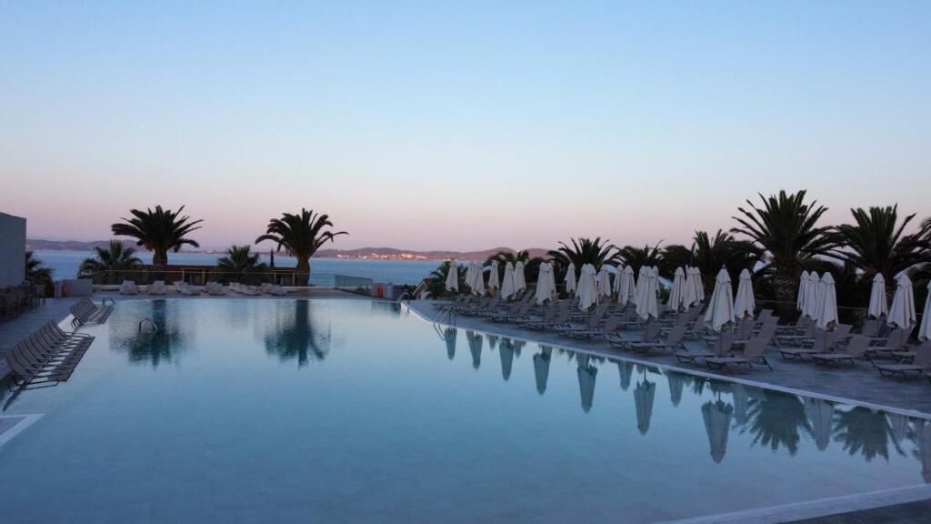 Indoor pool, outdoor pool, pool umbrellas, pool loungers