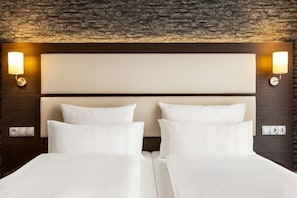 Premium bedding, free minibar, in-room safe, desk