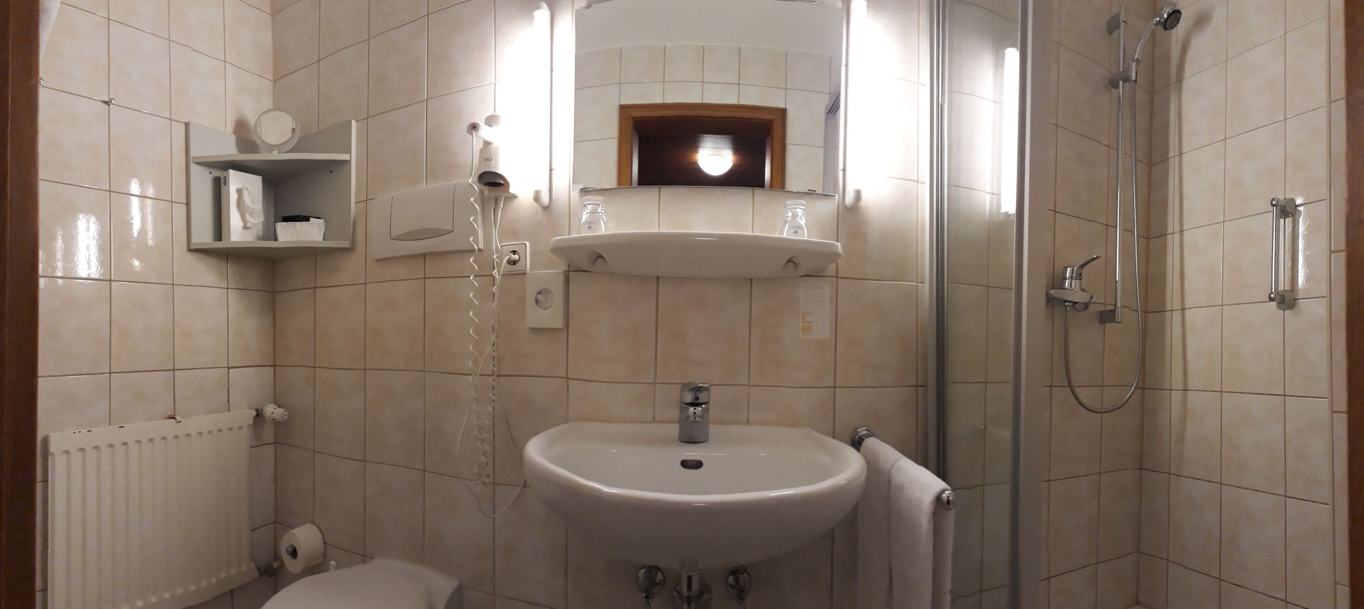 deep-soaking bathtub, hair dryer, towels