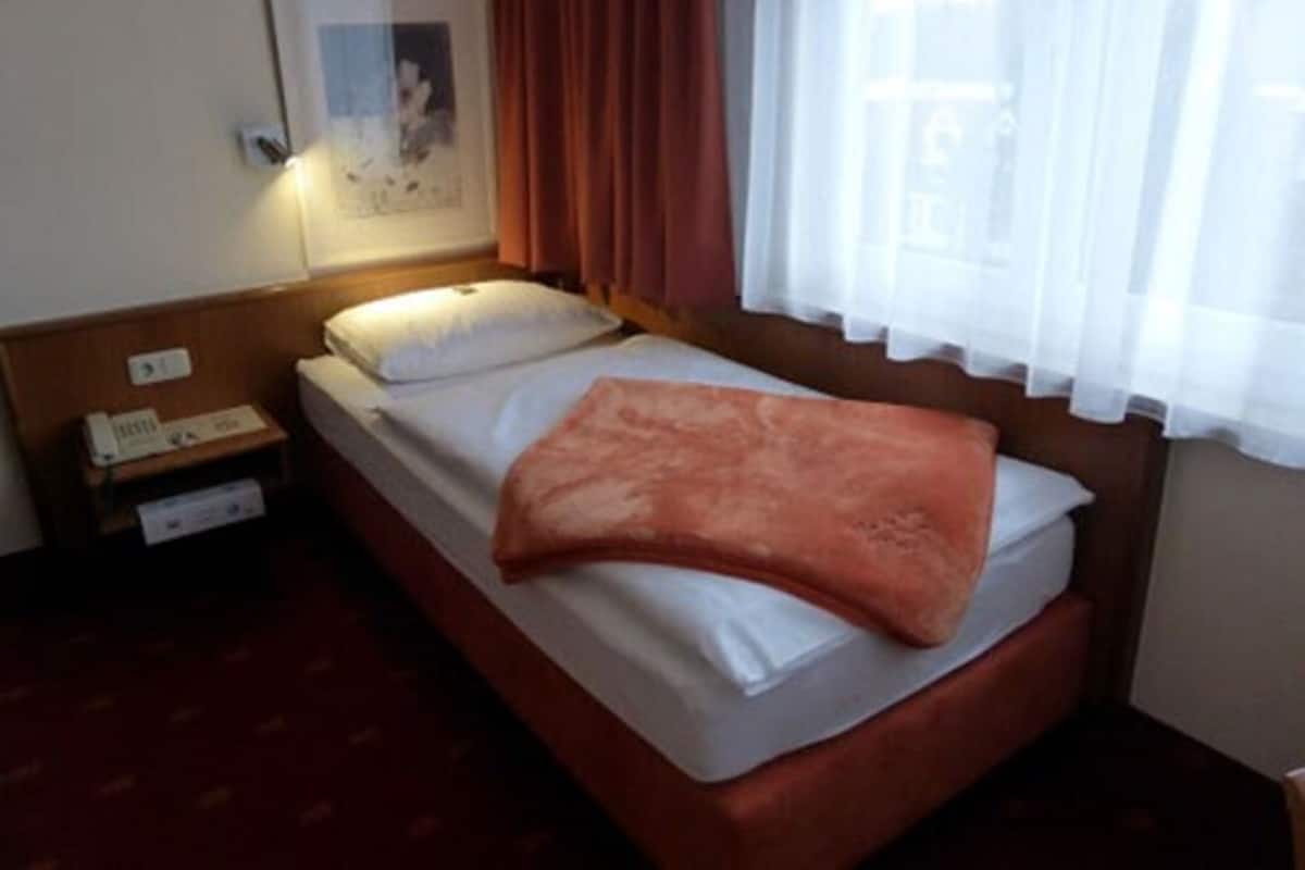 Standaard eenpersoonskamer | 1 slaapkamer, hypoallergeen beddengoed, een kluis op de kamer