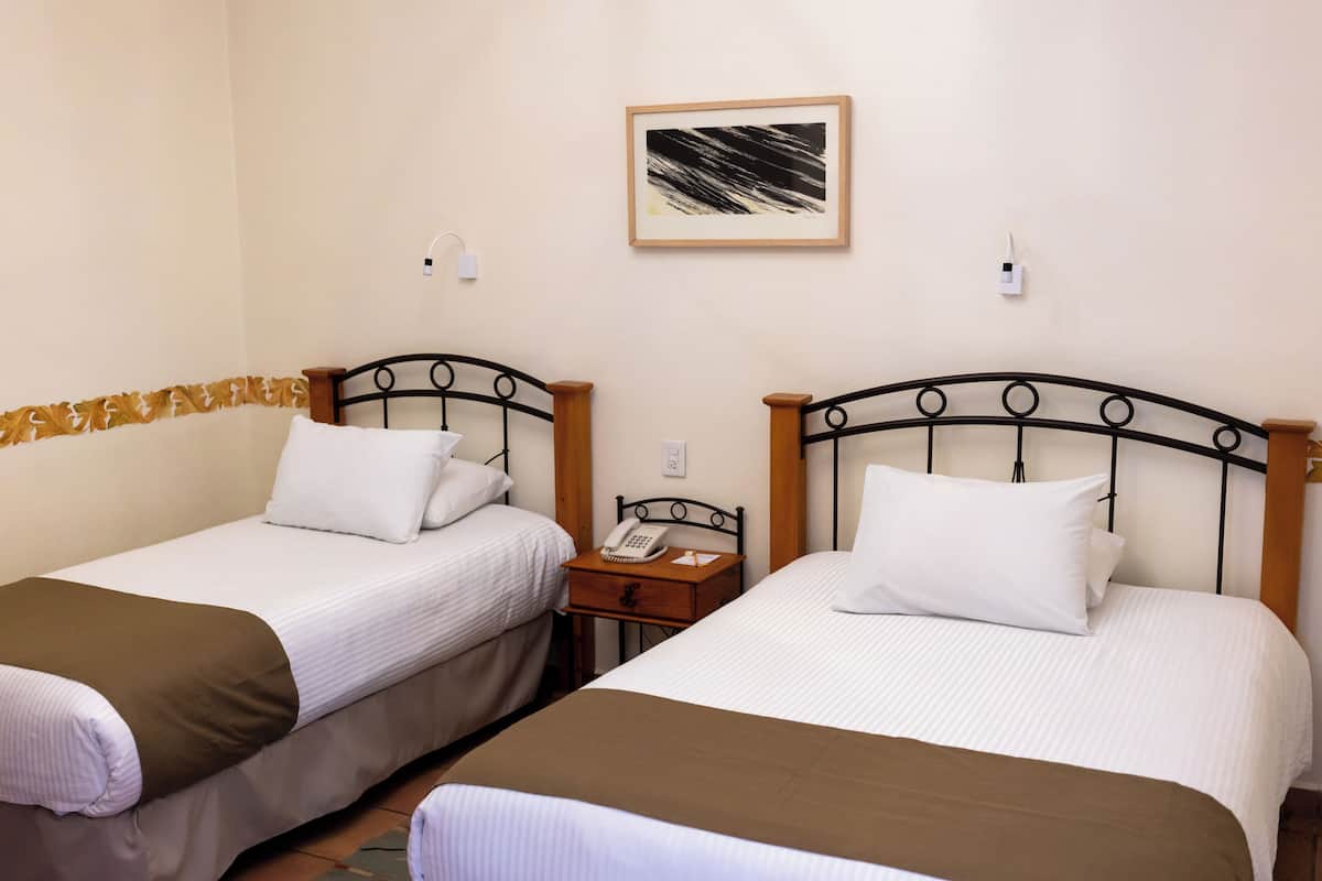 Standard-Dreibettzimmer | 1 Schlafzimmer, hochwertige Bettwaren, Verdunkelungsvorhänge