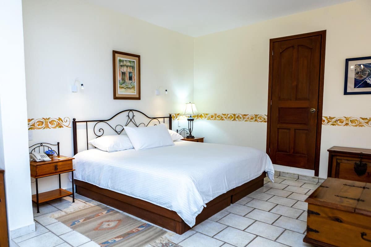 1 bedroom, premium bedding, blackout curtains, iron/ironing board