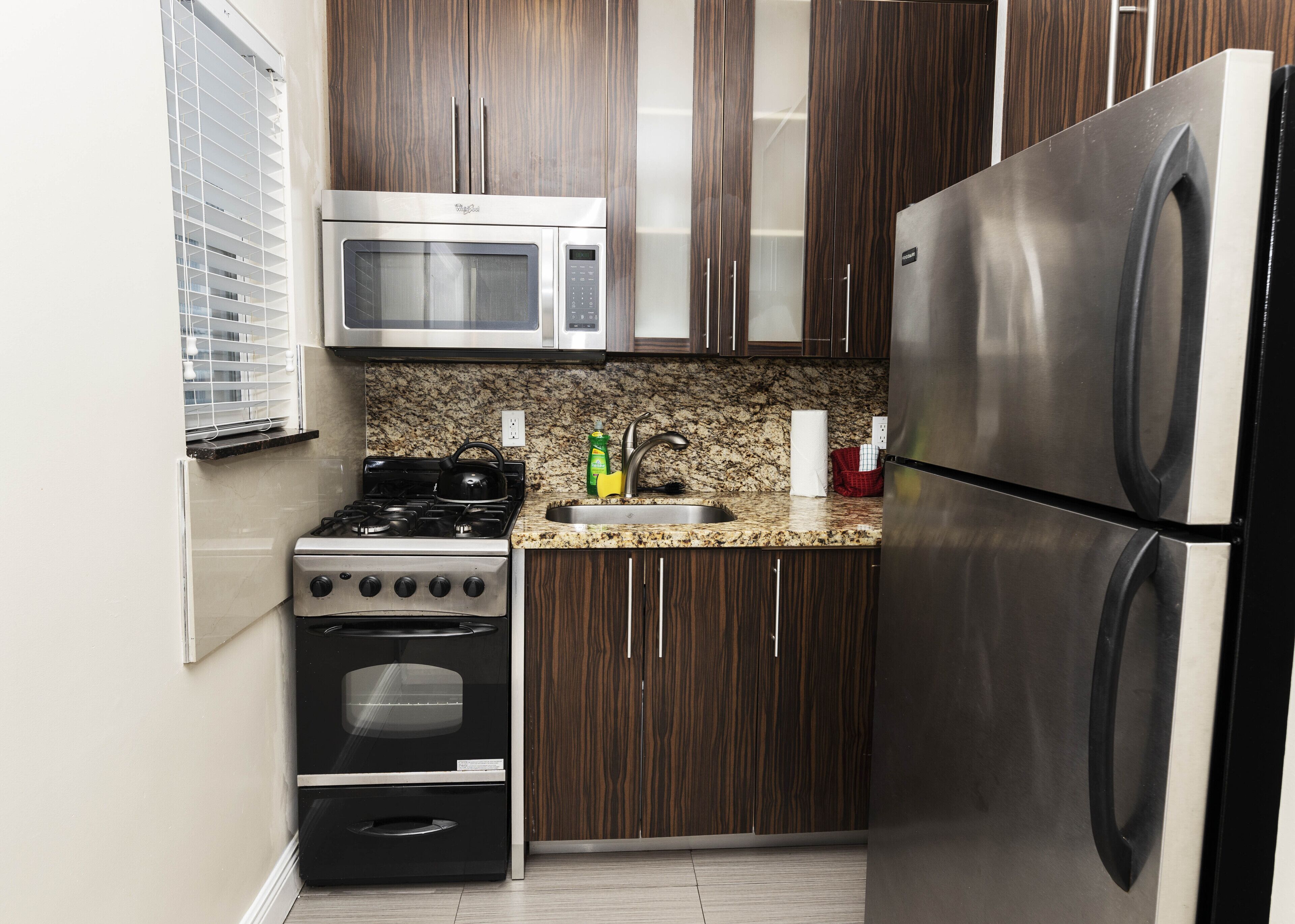 exclusive studio suite | private kitchen | full-sized fridge, microwave, stovetop, cookware/dishes/utensils