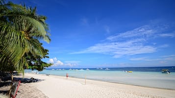 On the beach, white sand