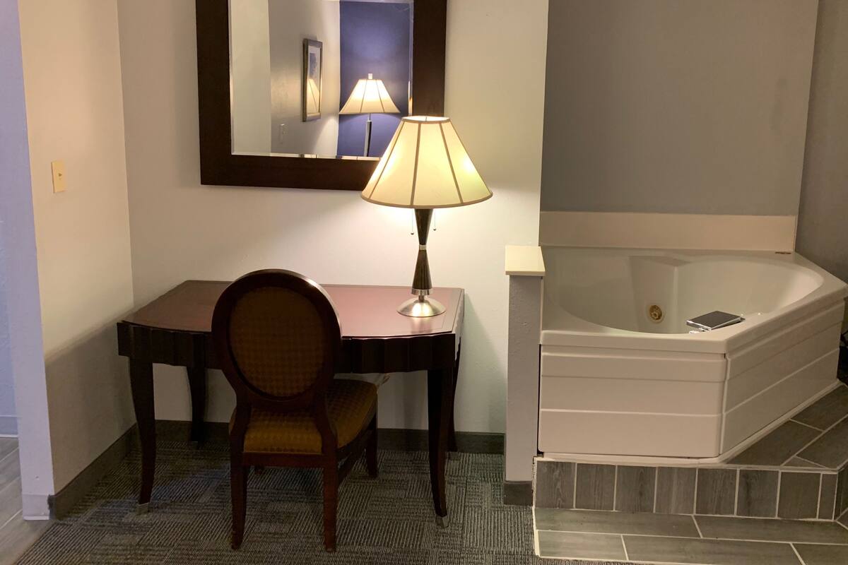 Desk, laptop workspace, blackout drapes, iron/ironing board (on request)