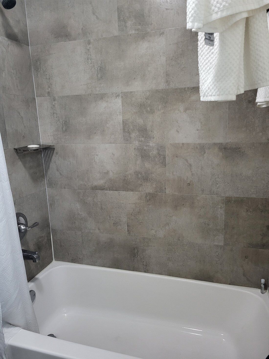 combined shower/bathtub, free toiletries, hair dryer, towels