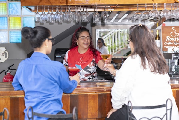 Breakfast, lunch served; Caribbean cuisine, pool views