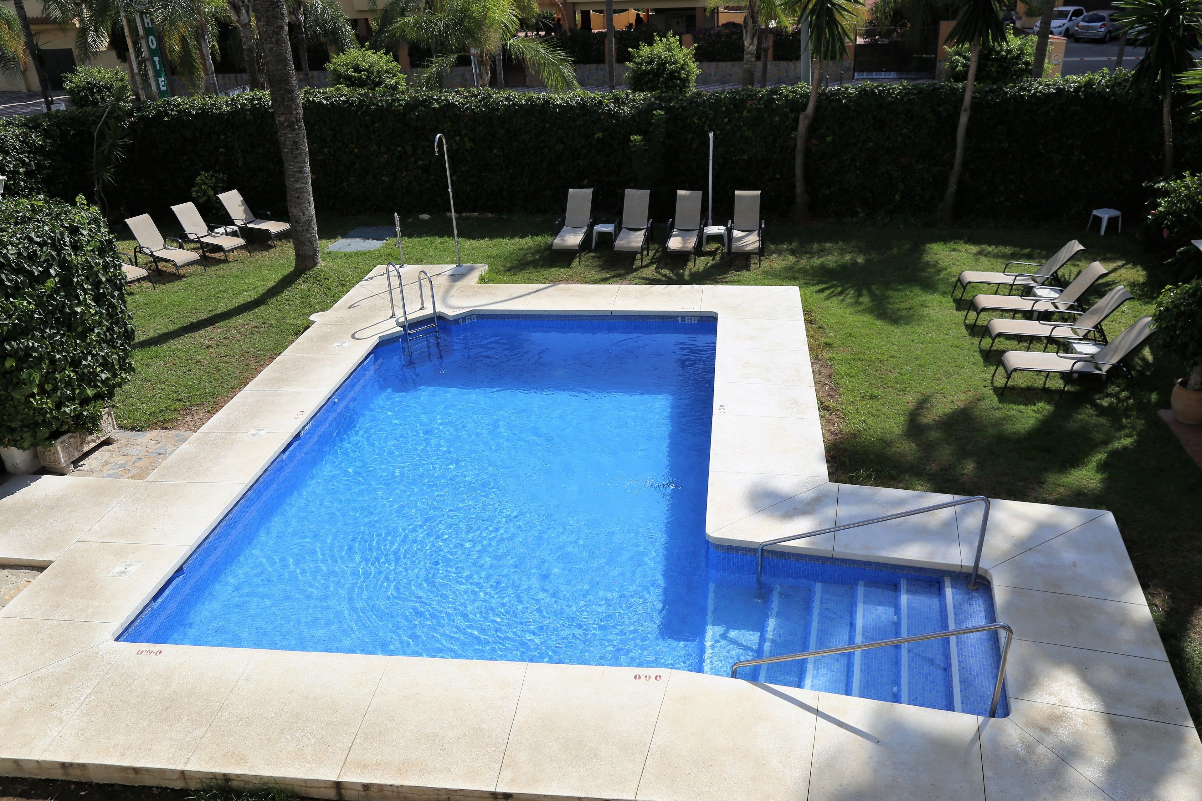 outdoor pool, pool loungers
