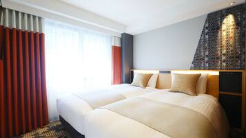 Coffres-forts dans les chambres, fer et planche Ă repasser