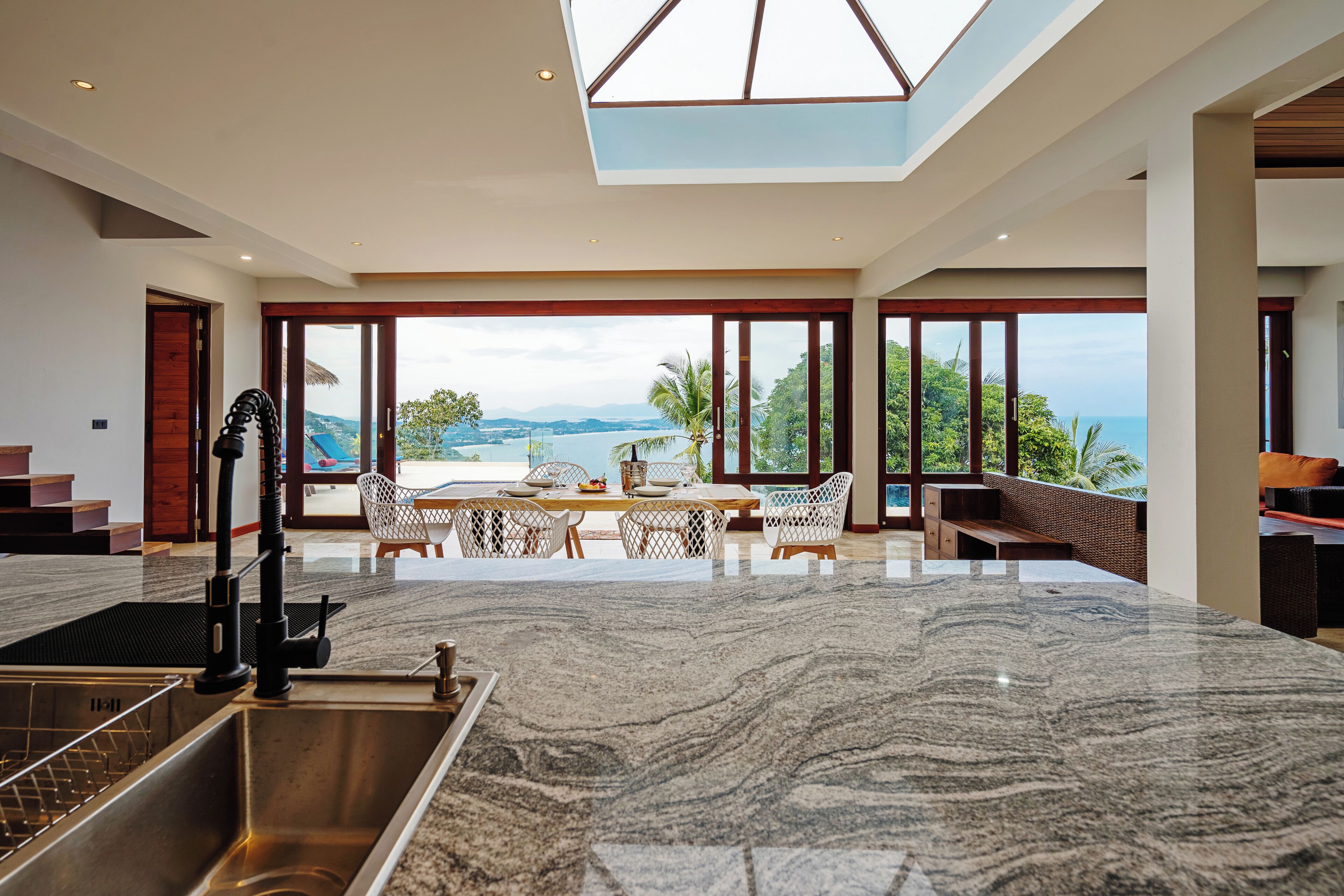 two-bedroom ocean view grand pool villa | living area | 42-inch flat-screen tv with digital channels, tv, netflix