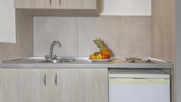 Habitación Deluxe | Caja fuerte, sistema de insonorización, tabla de planchar con plancha
