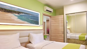 Suite Familiale, 3 chambres | Salle de bain | Articles de toilette gratuits, serviettes fournies