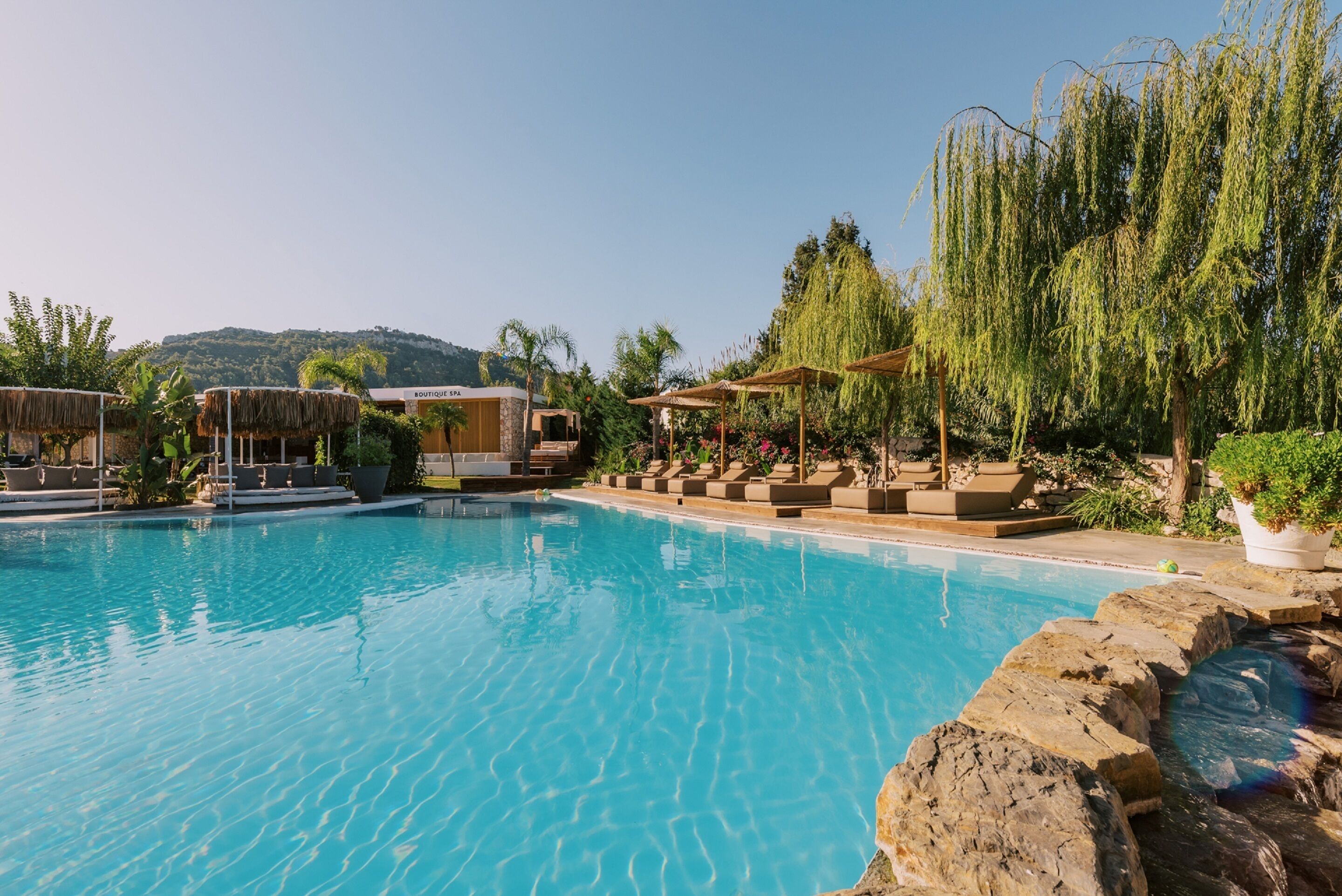Seasonal outdoor pool, free pool cabanas, pool umbrellas