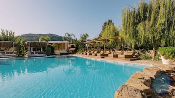 Seasonal outdoor pool, free pool cabanas, pool umbrellas