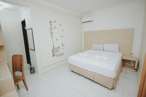 Premium bedding, minibar, free WiFi - New Hotel Lilik (Yogyakarta)