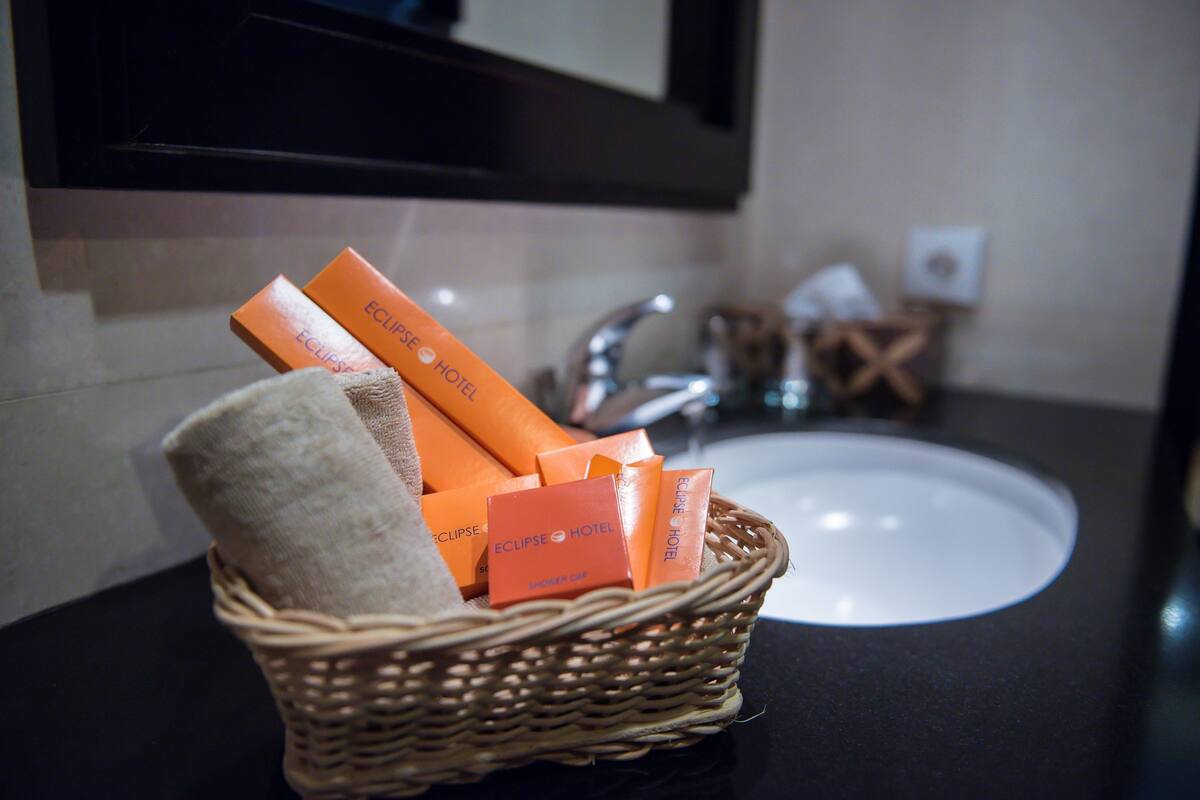 superior twin room | bathroom amenities | shower, rainfall showerhead, hair dryer, slippers