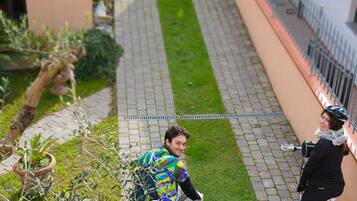 Residents enjoy a leisurely bike ride along the pedestrian-friendly pathway.
