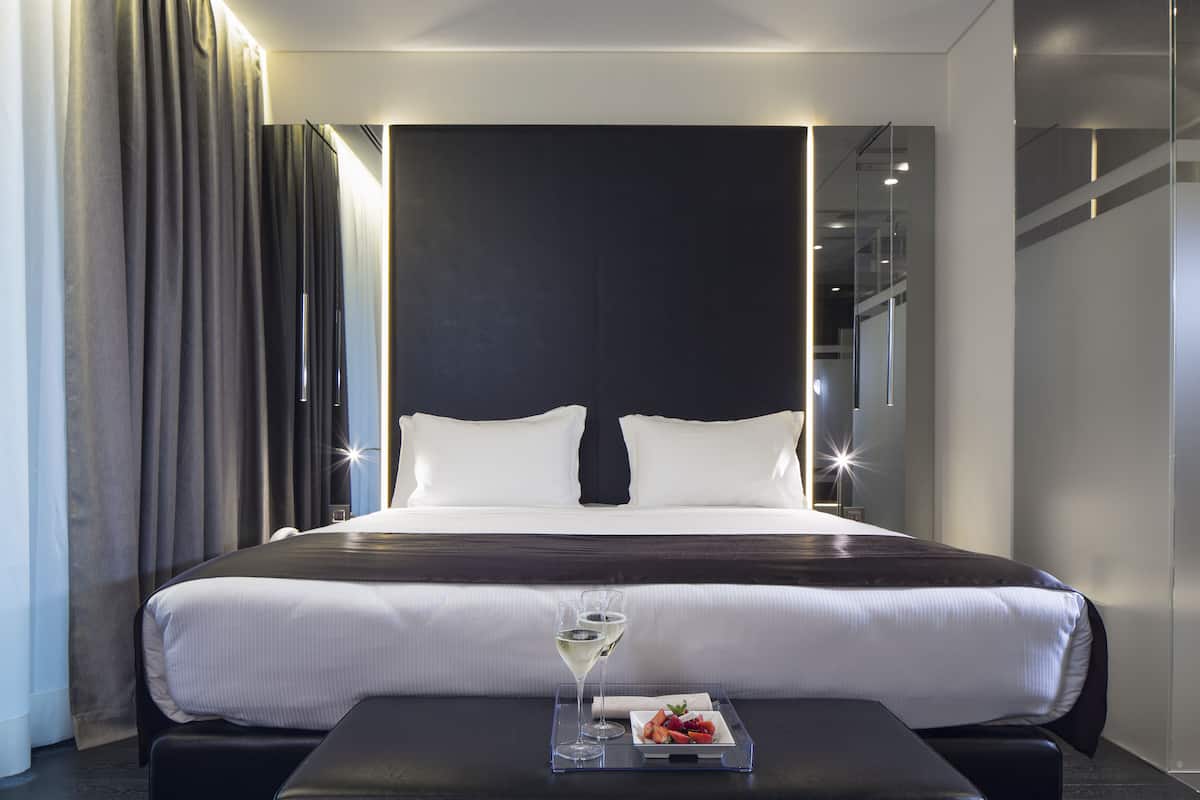 Premium bedding, pillowtop beds, minibar, in-room safe