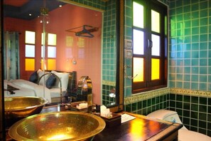 Shower, rainfall showerhead, designer toiletries, towels