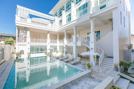 Outdoor pool, sun loungers