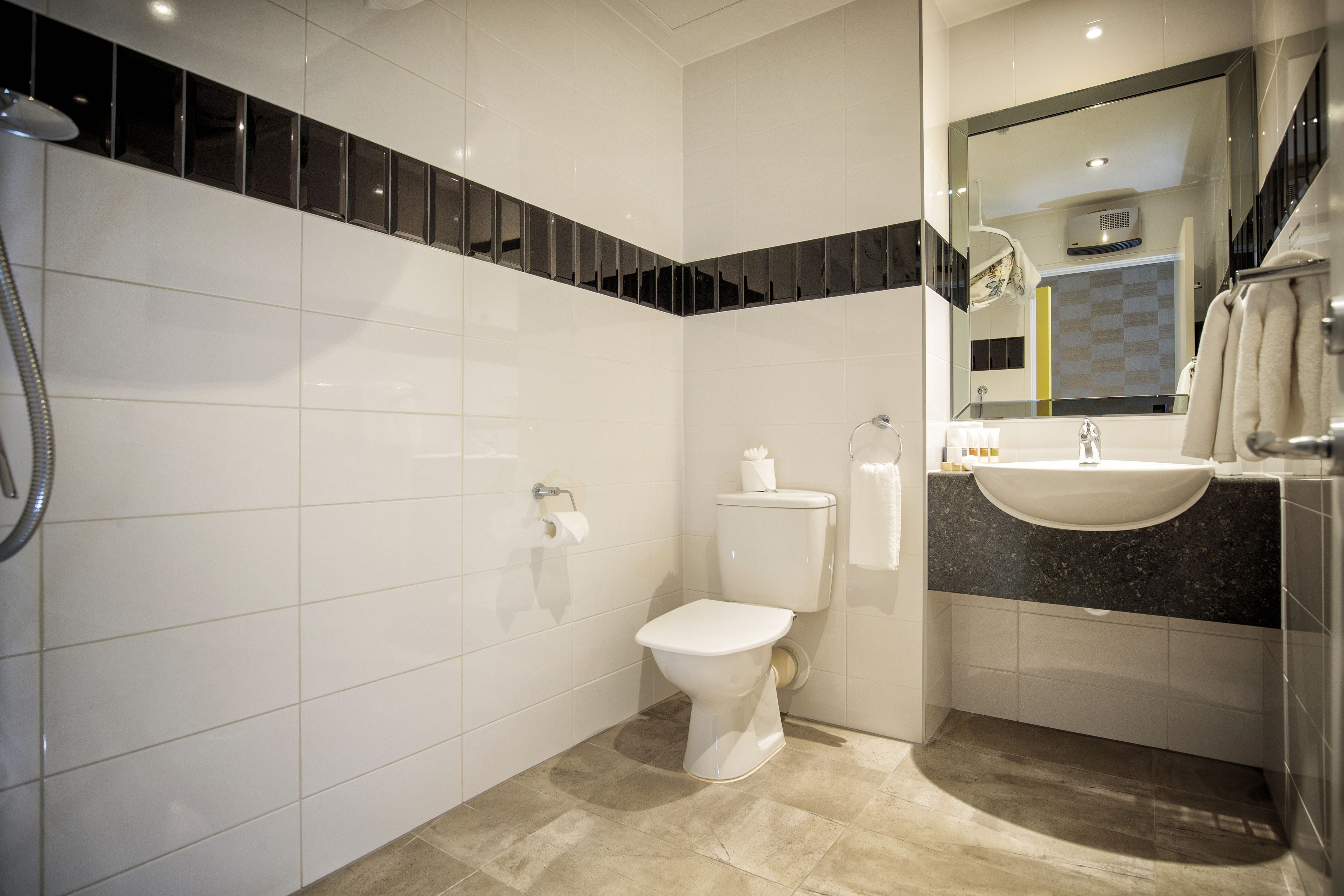 shower, eco-friendly toiletries, hair dryer, towels